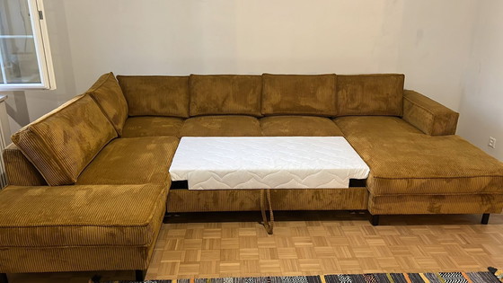 Image 1 of Grote bank van corduroy in mosterdgeel en okerkleurig currygroen.