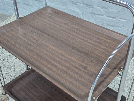Image 1 of Vintage Foldable and Mobile Chrome Steel 2 Faux Wood Layers ‘Dinett’ Serving Trolley by Bremshey Gerlinol, Germany, 1970s. 