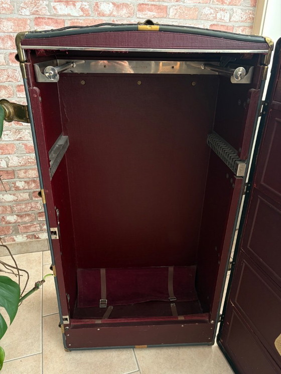 Image 1 of Oshkosh stoombootkoffer uit 1920