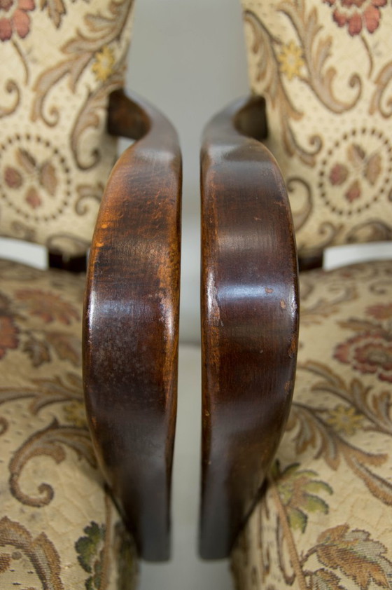 Image 1 of Een paar art deco fauteuils van gebogen hout met originele bloemenbekleding, circa jaren 1930.