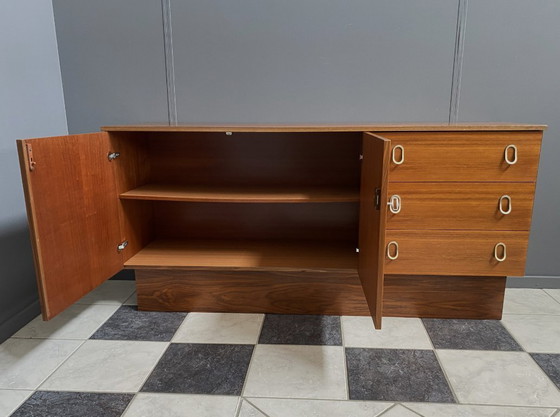 Image 1 of Sideboard brass grips on the drawers 1970s palisander