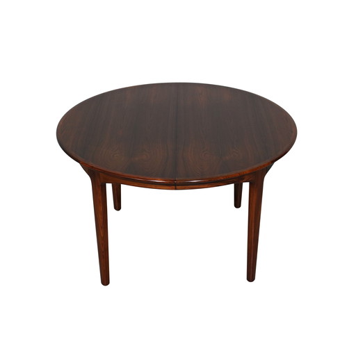 Table de salle à manger extensible en bois de rose par Henning Kjaernulf