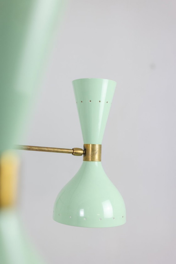 Image 1 of Lustre rayonnant de forme diabolo à 12 lumières. Contemporain.