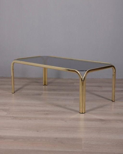 Vintage 1970s Italian-design coffee table in gilded brass and smoked glass 
