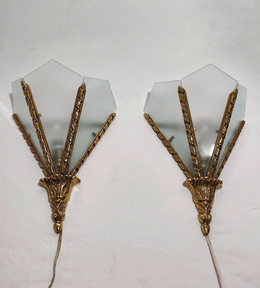 Pair of bronze wall sconces. Spain, 1980s.