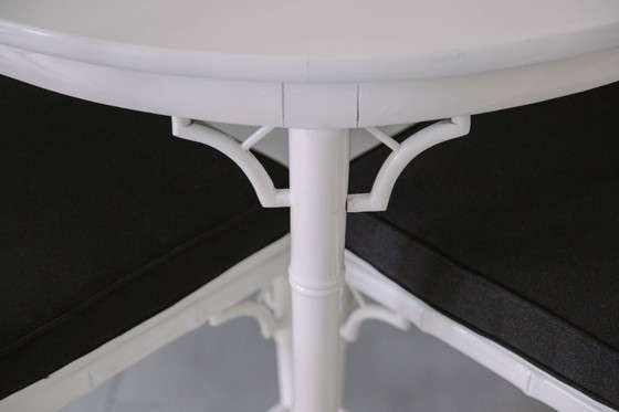 Image 1 of Dining room table and 4 chairs Jonathan Adler style. In 2024 the seats of the chairs are upholstered in black fabric.