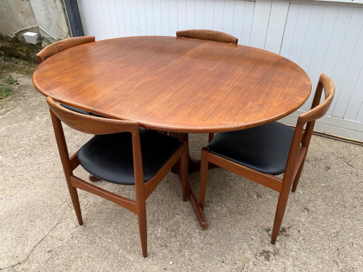 Baumann Scandinavian oval extensible table in teak and teak veneer 1960 NF