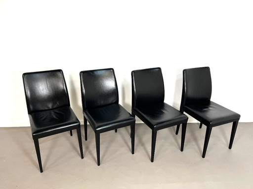 4 chaises de salle à manger LIZ en cuir noir de style postmoderne, par Poltrona, Italie, années 1990.