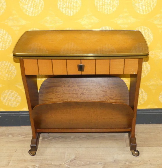 Image 1 of 50s bijzettafel krantenstandaard klein meubel krantentafel op wielen met lade vintage retro formica