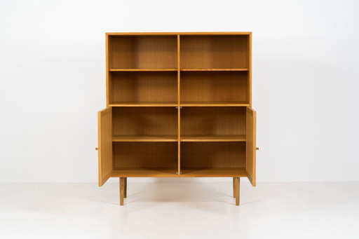 Eikenhouten boekenkast van Rud Thygesen & Johnny Sørensen voor HG meubelen (Denemarken, jaren 60).