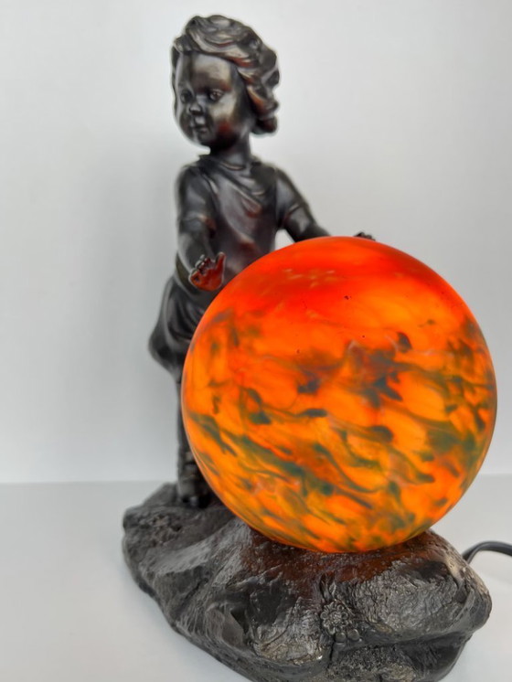 Image 1 of Lampada da tavolo vintage in stile Art Nouveau - Ragazza con palla di vetro arancione