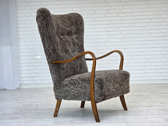 Image 1 of 1960s Reupholstered Danish Armchair with Stool, Genuine Sheepskin