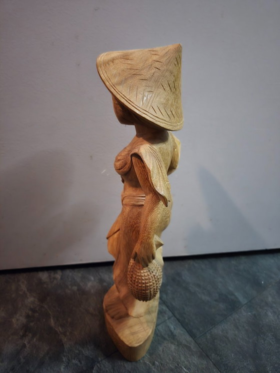 Image 1 of Balinese wooden female statue. Height 44 cm