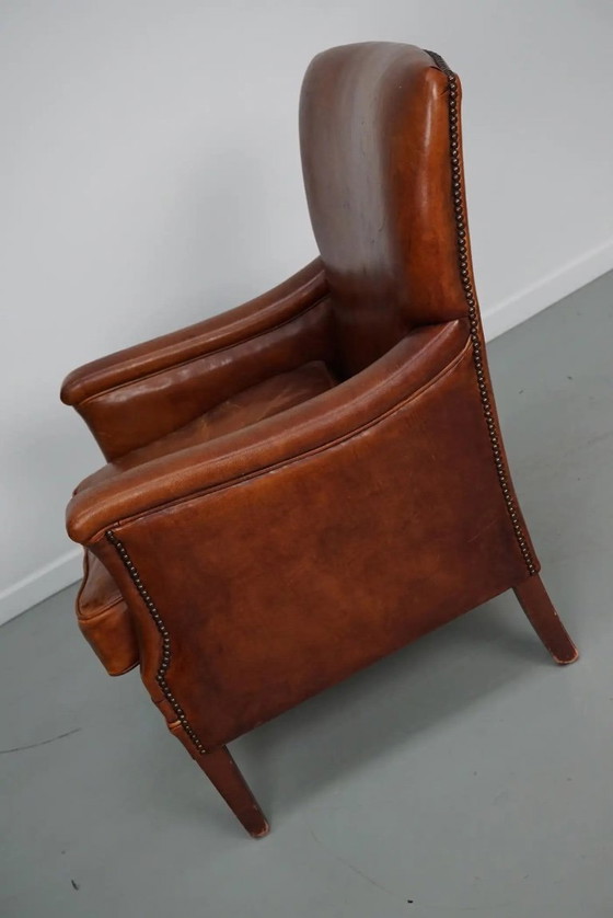 Image 1 of Vintage Nederlandse clubfauteuil van cognackleurig leer