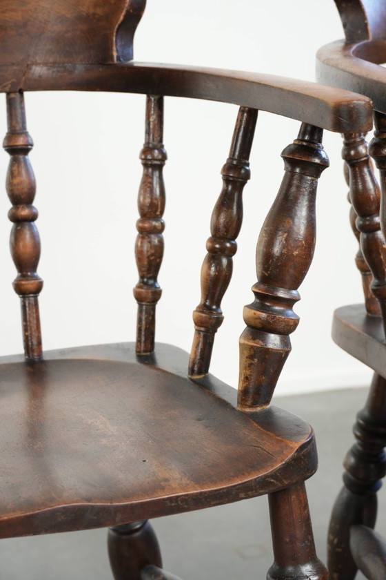 Image 1 of 4 x Antique wooden English pub/captain chairs from the late 19th century with character
