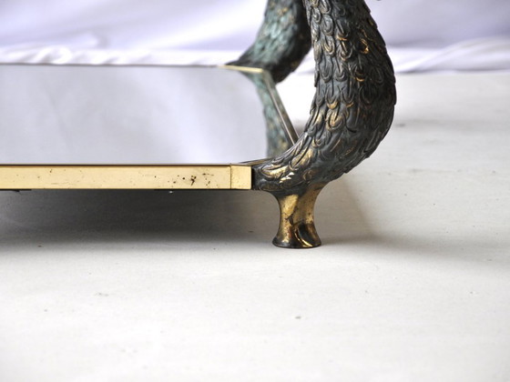 Image 1 of Vintage glazen salontafel met sculpturaal zwanenframe en glazen blad