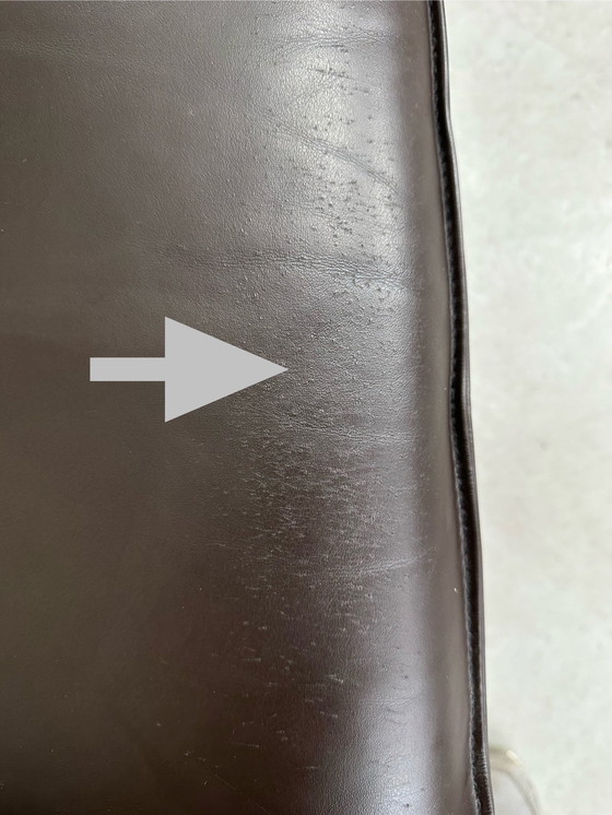 Image 1 of Vintage Leolux bruinkleurige lederen/eiken ‘Lounge chair and ottoman’ van Harry de Groot - 1970