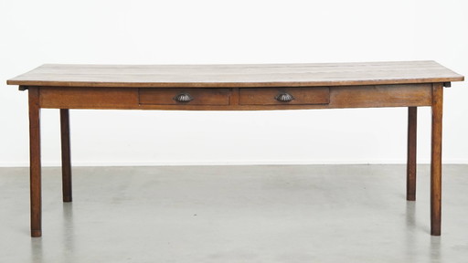 Large antique French dining table from 1800 made of oak with 2 drawers