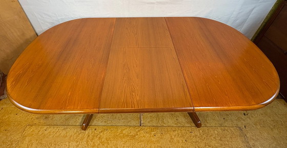 Image 1 of Mid Century Retro Teak Oval Danish Extending Dining Table (Circa 1960–1970)  A stunning mid century modern teak oval extending d