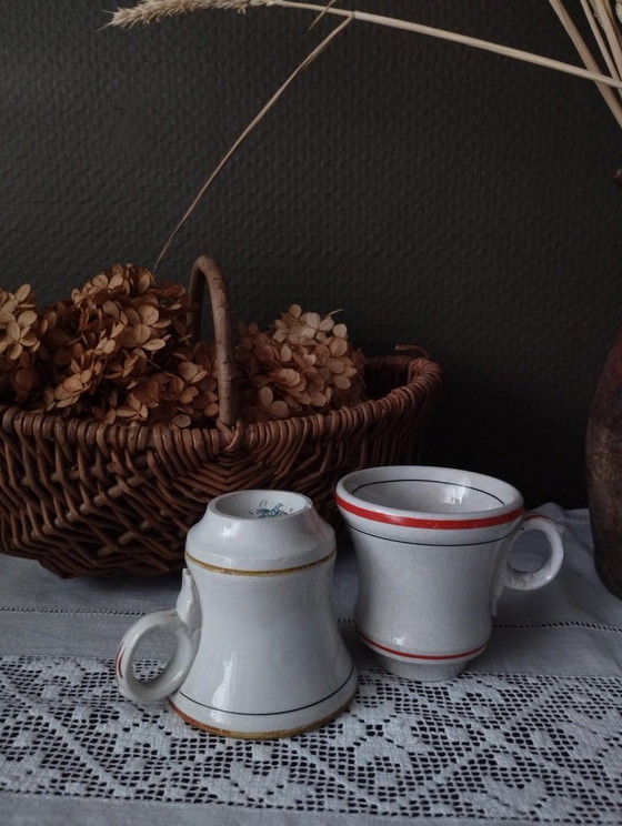 Image 1 of Een paar Sarreguemines ondoorzichtige porseleinen vuurkorfjes (1857-1900)