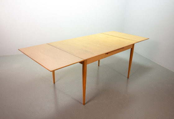 Image 1 of Large Mid-Century Design Extendable Solid Beech Wooden Dining Table in style of Arno Lambrecht. Germany, 1950s.