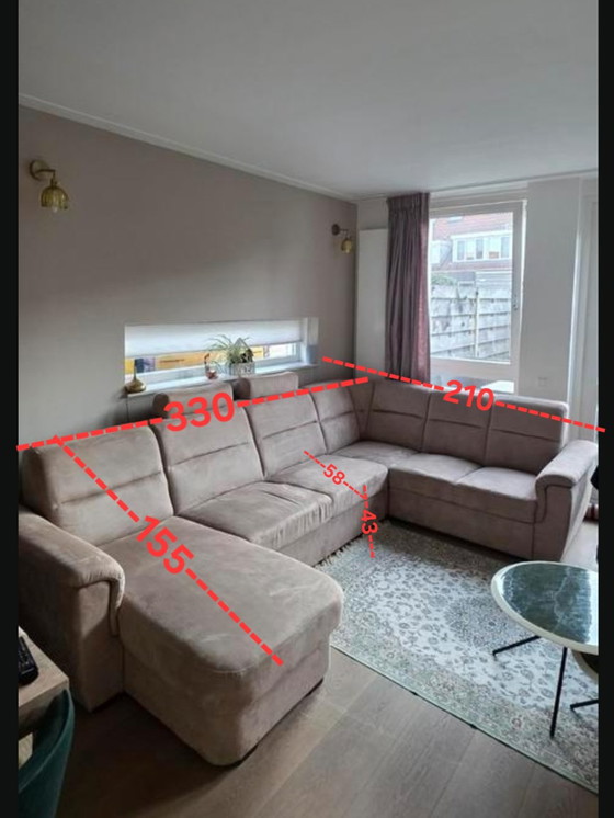 Image 1 of U-shaped sofa with sofa bed function and storage space