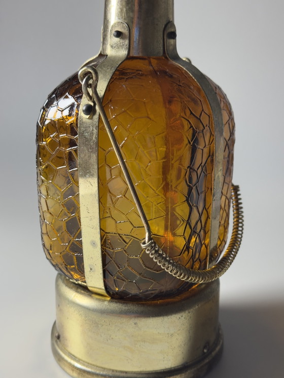 Image 1 of Bouteille carafe musicale vintage – Mécanisme musical à remontoir – Inspiration Steampunk et Art Déco – vers 1970
