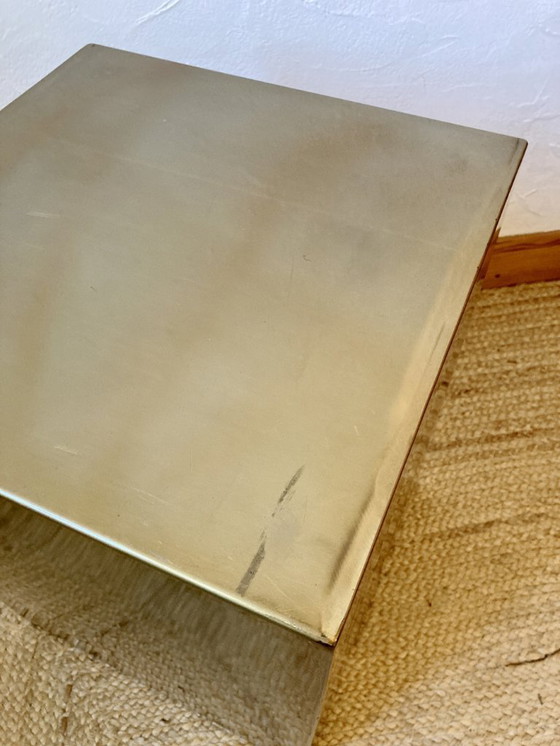 Image 1 of Electro-galvanized metal seat, brass effect. Pharrell Williams / Louis Vuitton fashion show, 2024