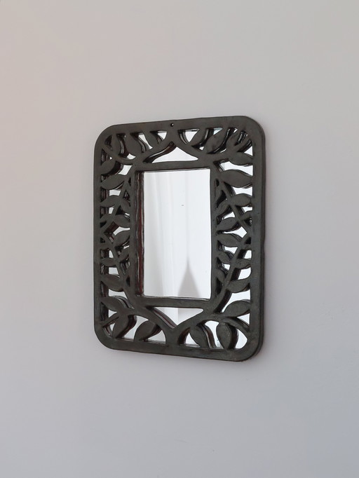 Vintage keramische wandspiegel, ontworpen door een kunstenaar, met bloemendecoratie.