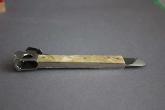 Image 1 of Tagliasigari vintage Solingen a forma di freccia con manico in madreperla, nella confezione originale.