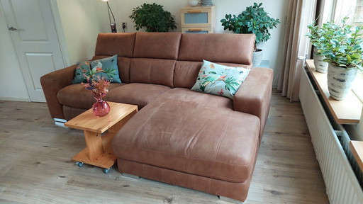 Longchair sofa with relaxation system