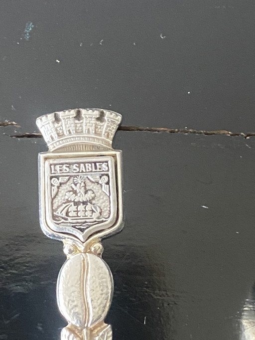 Set of 12 small vintage silver souvenir spoons