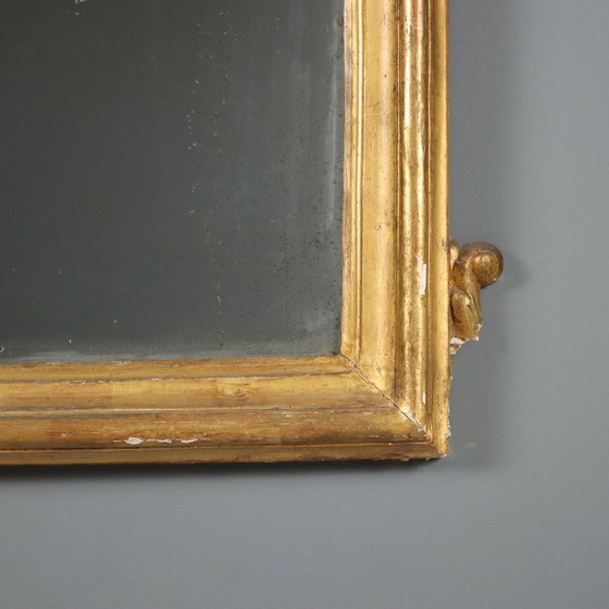 Image 1 of Miroir avec cadre en bois sculpté et doré