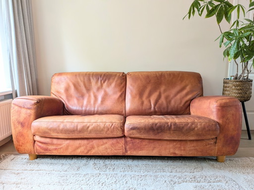 Set divano e poltrona in pelle Molinari, design italiano.