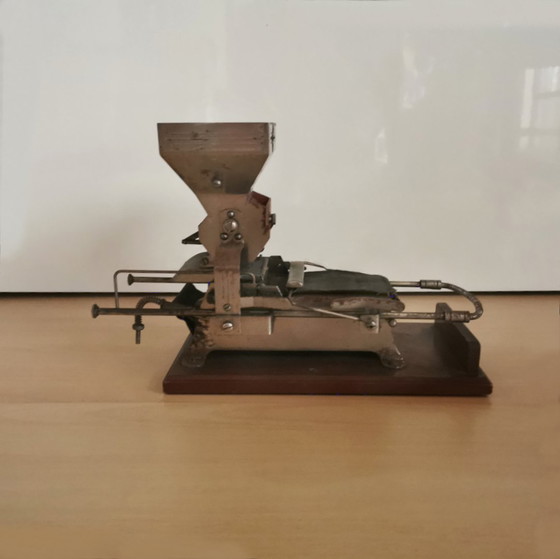 Image 1 of CIGARETTE ROLLING MACHINE AND INSTRUCTIONS FOR USE