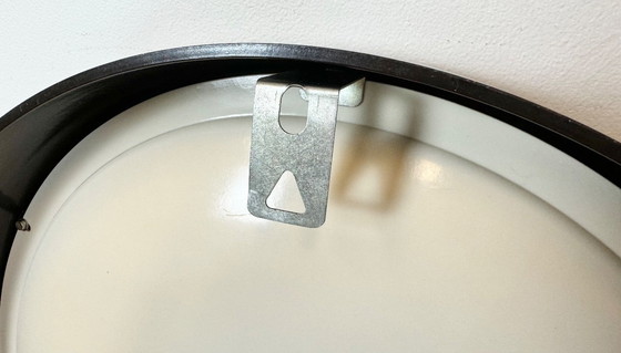 Image 1 of Grote industriële bakelieten fabriekswandklok van Pragotron, jaren 60