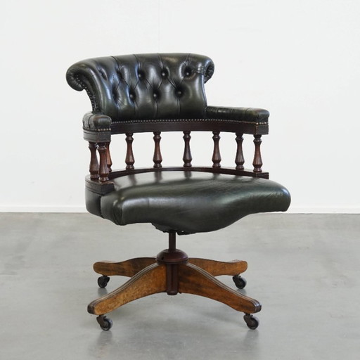 Dark green cowhide leather and wood swiffle and tilt chesterfield office chair