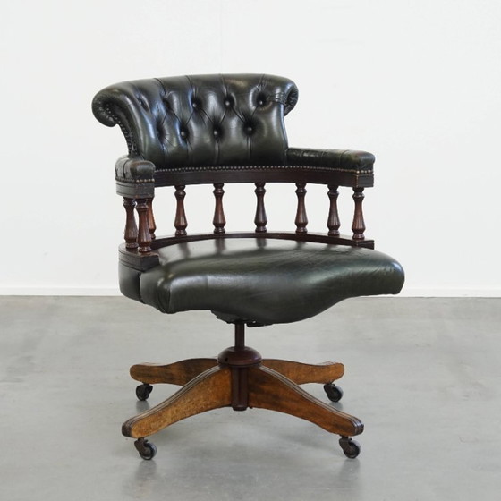 Image 1 of Dark green cowhide leather and wood swiffle and tilt chesterfield office chair