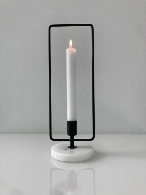 Tough Candlestick Of Sleek Black Steel With White Marble Base