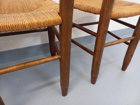 Image 1 of Set van 4 vintage brutalistische stoelen van hout en stro uit de jaren 60.