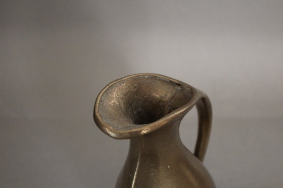 Image 1 of Massive, heavy brass vase in the shape of a jug