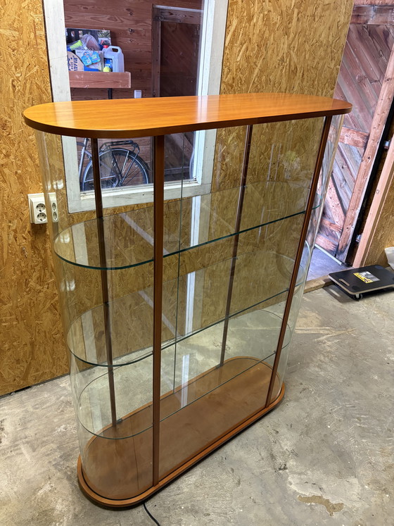 Image 1 of Vintage Fiam Italia oval cherry wood and glass display cabinet