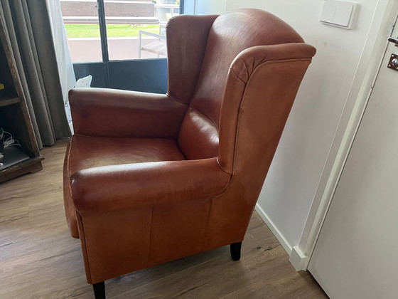 Image 1 of Poltrona con orecchie in pelle