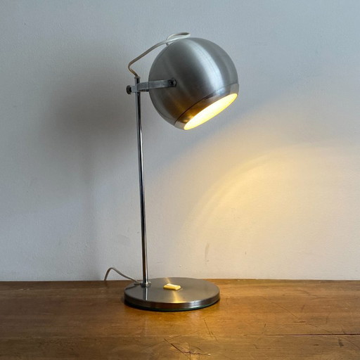 Eyeball lamp. 1970. Brushed stainless steel.