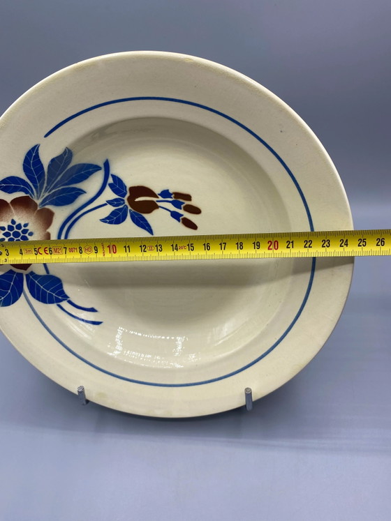Plat profond en faïence bleue et brune à motifs floraux Art déco – Objets déco, Art Deco (photo 4 of 4)