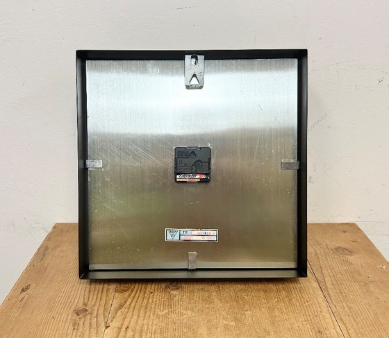 Image 1 of Zwarte industriële vierkante wandklok van Pragotron, jaren 70