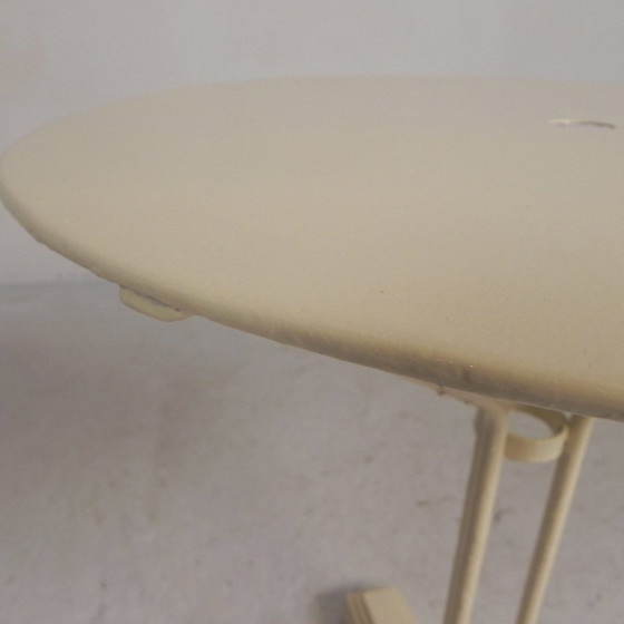 Bistro table with cast iron legs and round steel top, 1930s – Dining tables (photo 22 of 22)