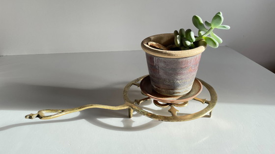 Image 1 of Solid brass trivet