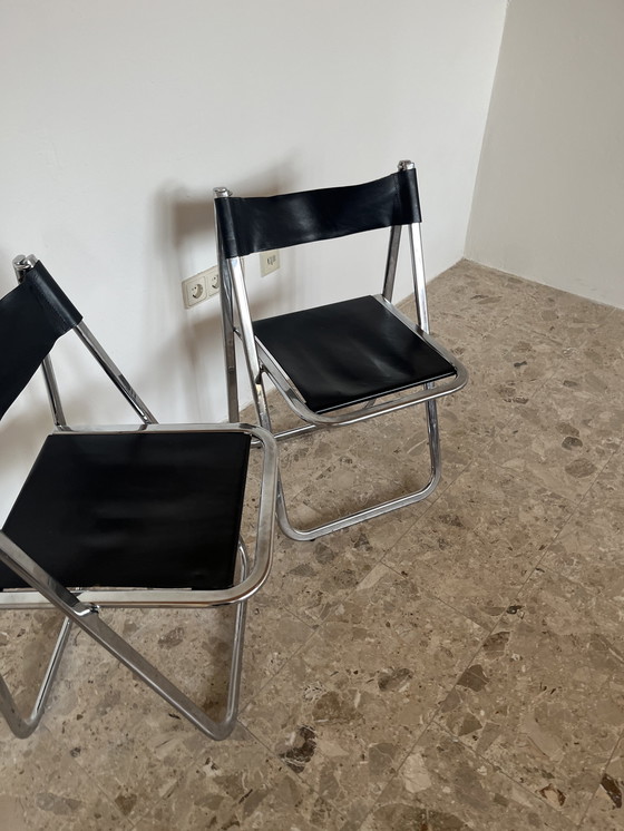 Image 1 of Originele Arrben Tamara klapstoelen met zwart leer
