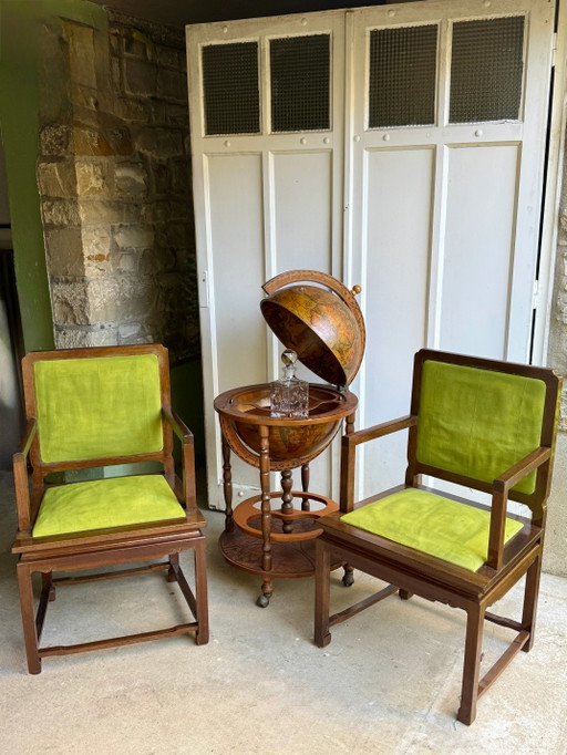Paire de fauteuils en bois exotique et tissu vert anis